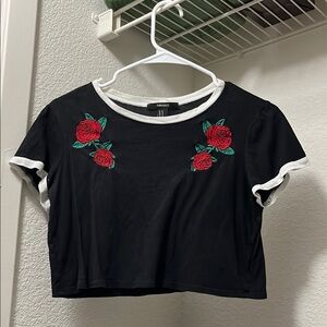 black embroidered design crop top